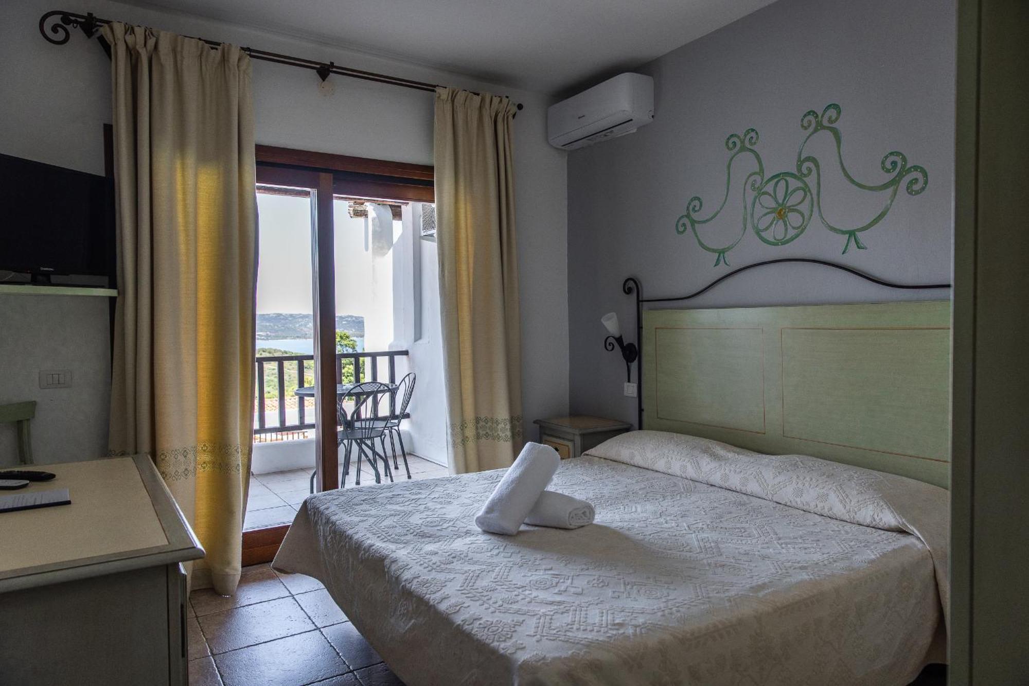 Hotel Pedra Santa Baja Sardinia Eksteriør billede